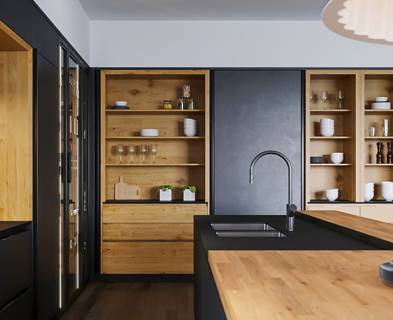 Modern custom closet features with drawers and LED lighting